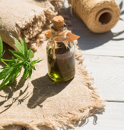 Rope, textiles and oil showing the variety of wholesale hemp products available.