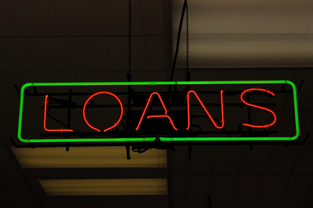 A light sign reading the word loans giving the idea of Hemp Business Loans.